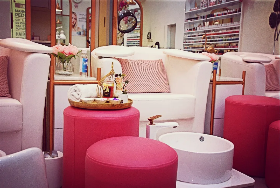 Inside Our Touch Beauty Salon — soft pink styling lounge