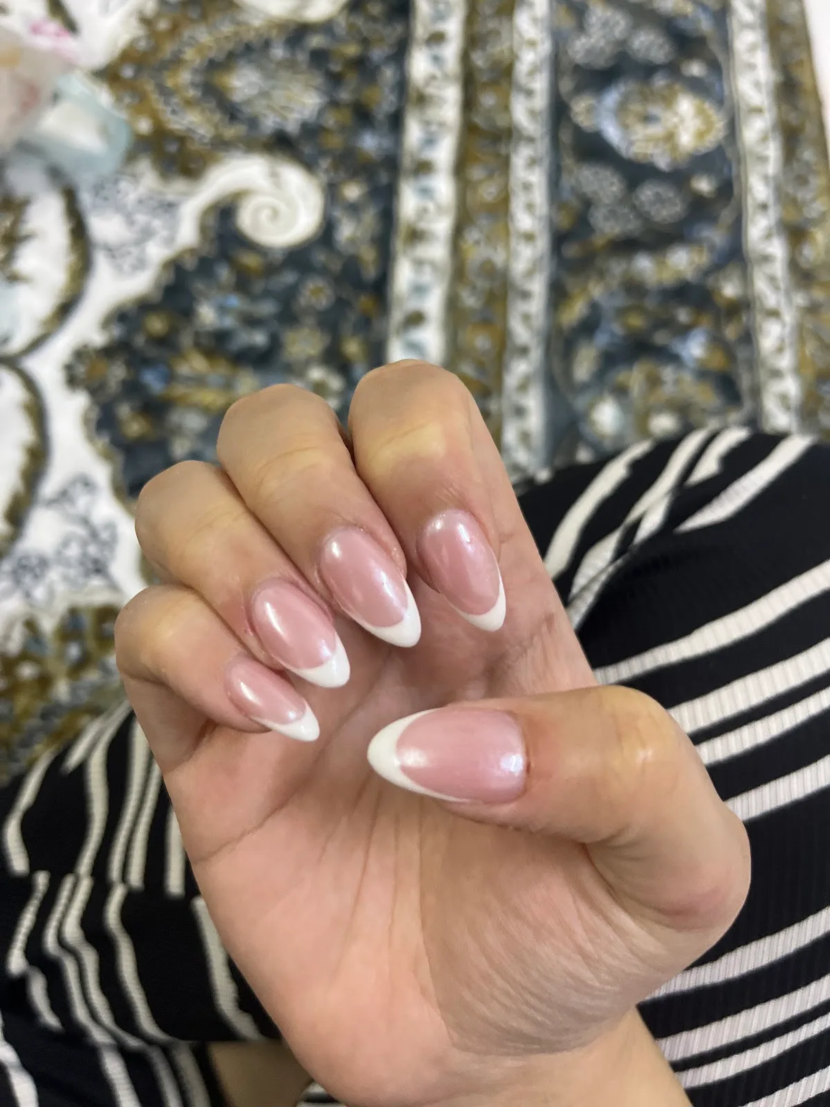 French almond nails with a chrome finish