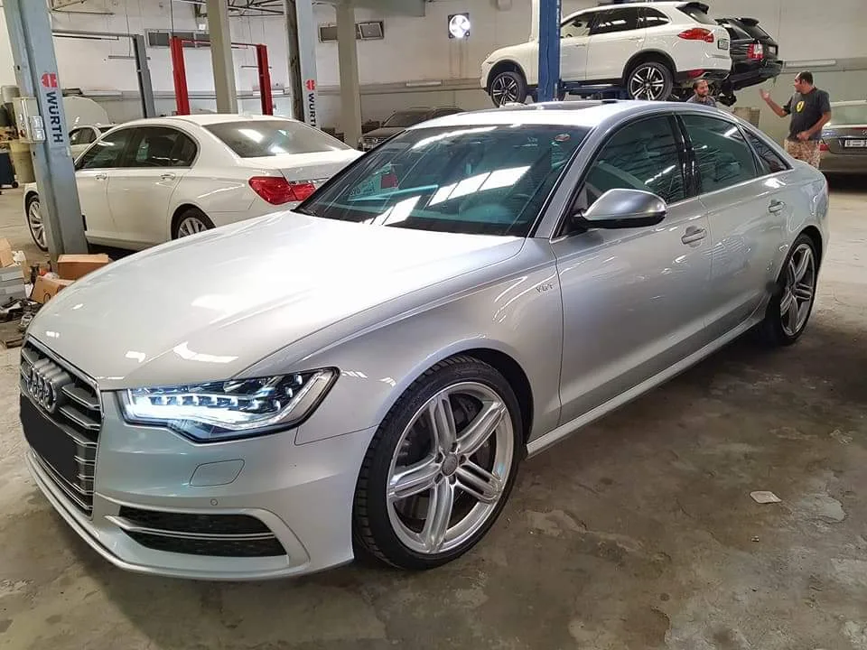 Silver Audi A6 in the workshop