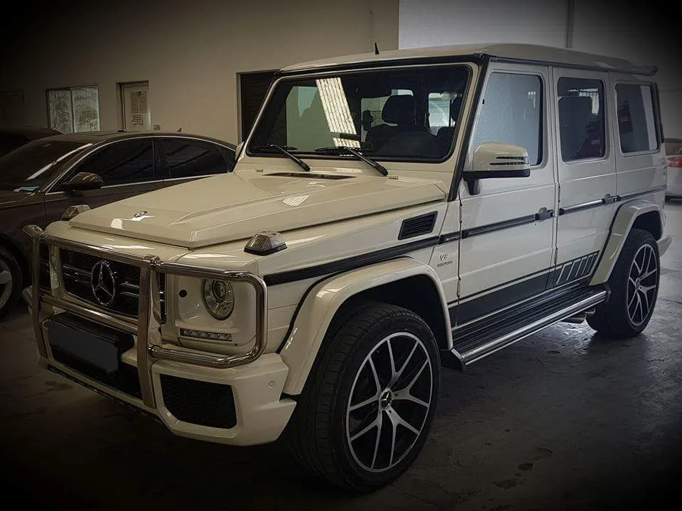 White Mercedes-Benz G-Class in the workshop