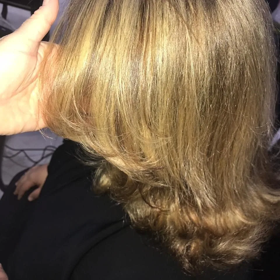 Freshly styled, glossy hair after a salon treatment