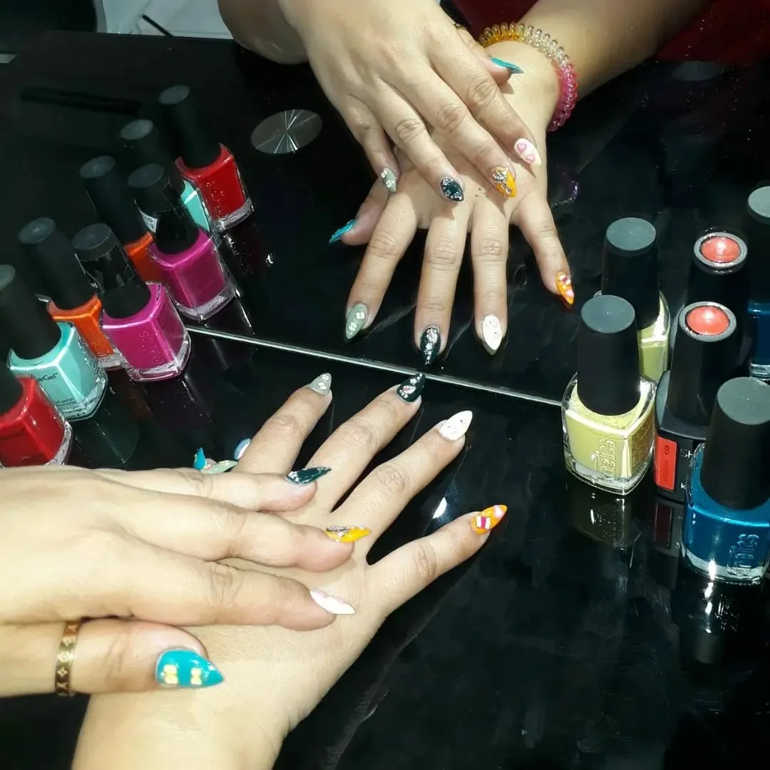 Colourful nail art and gel polish created at Sandhya Beauty Salon