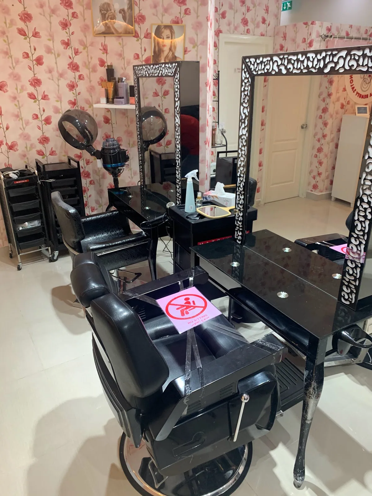 Styling chairs and mirrors inside Sandhya Beauty Salon