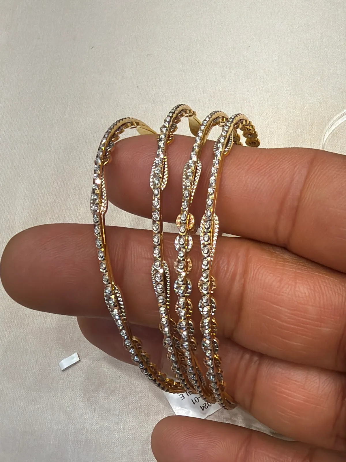 Diamond-cut gold bangles