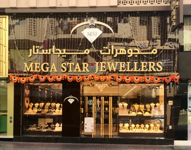 Mega Star Jewellers storefront in Al Souq Al Kabeer, Dubai, with the MSJ shooting-star and diamond sign