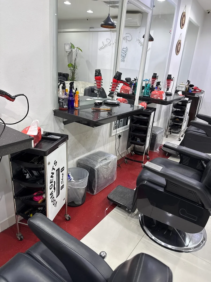Interior of VOOM Gents Salon showing barber chairs, mirror stations and the styling counter