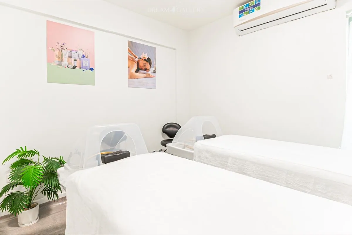 Calm private treatment room with two beds for facials and massage