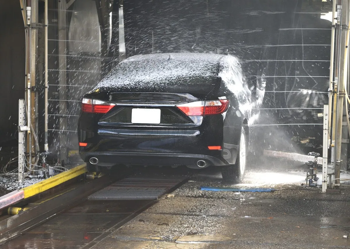 A car covered in cleaning foam during a wash