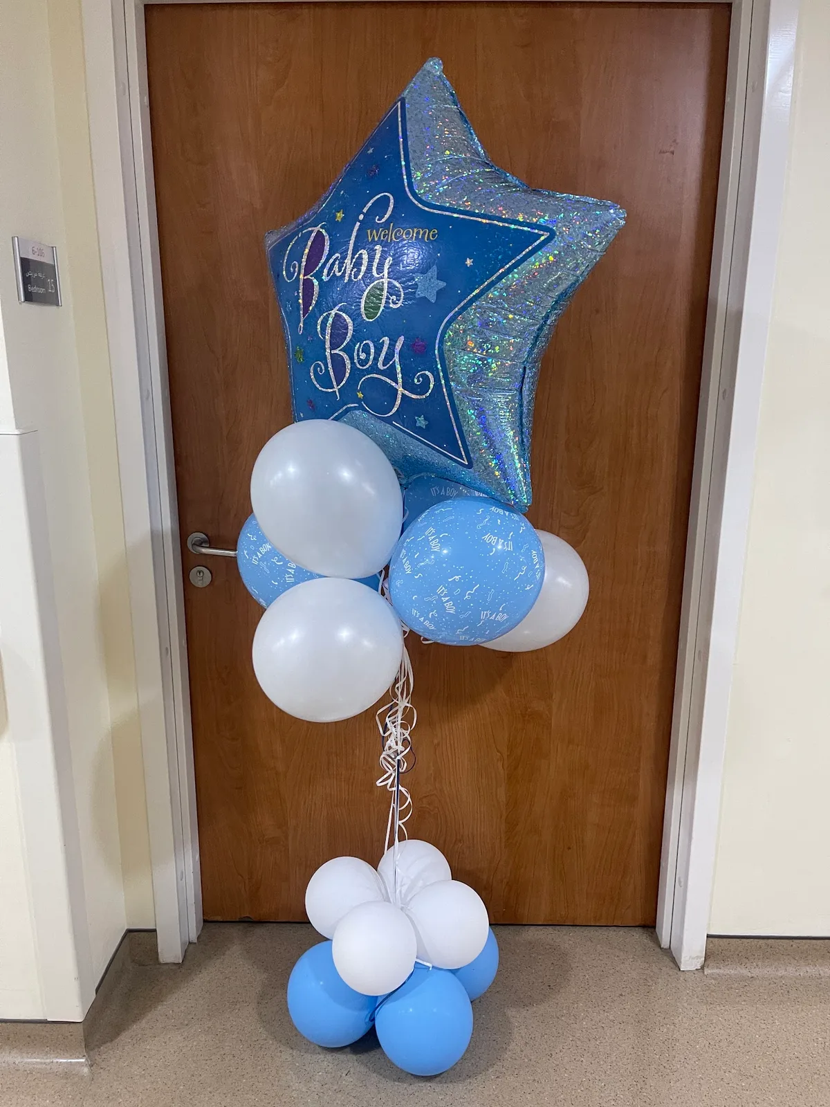 Welcome baby boy balloon stand arranged by the door