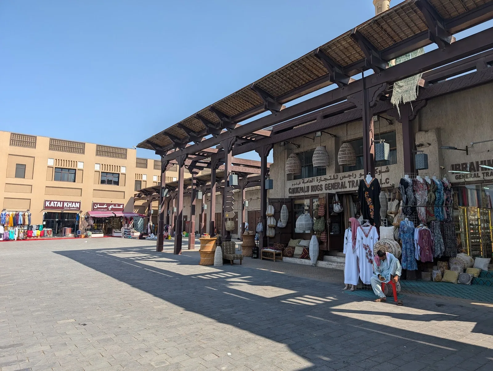 Chukpalu Rugs storefront under the timber arcade of Al Souq Al Kabeer, Bur Dubai